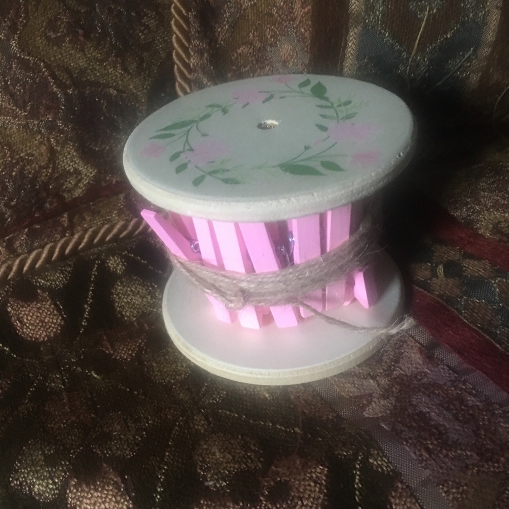 24 small clothes pins and 10 feet of twine